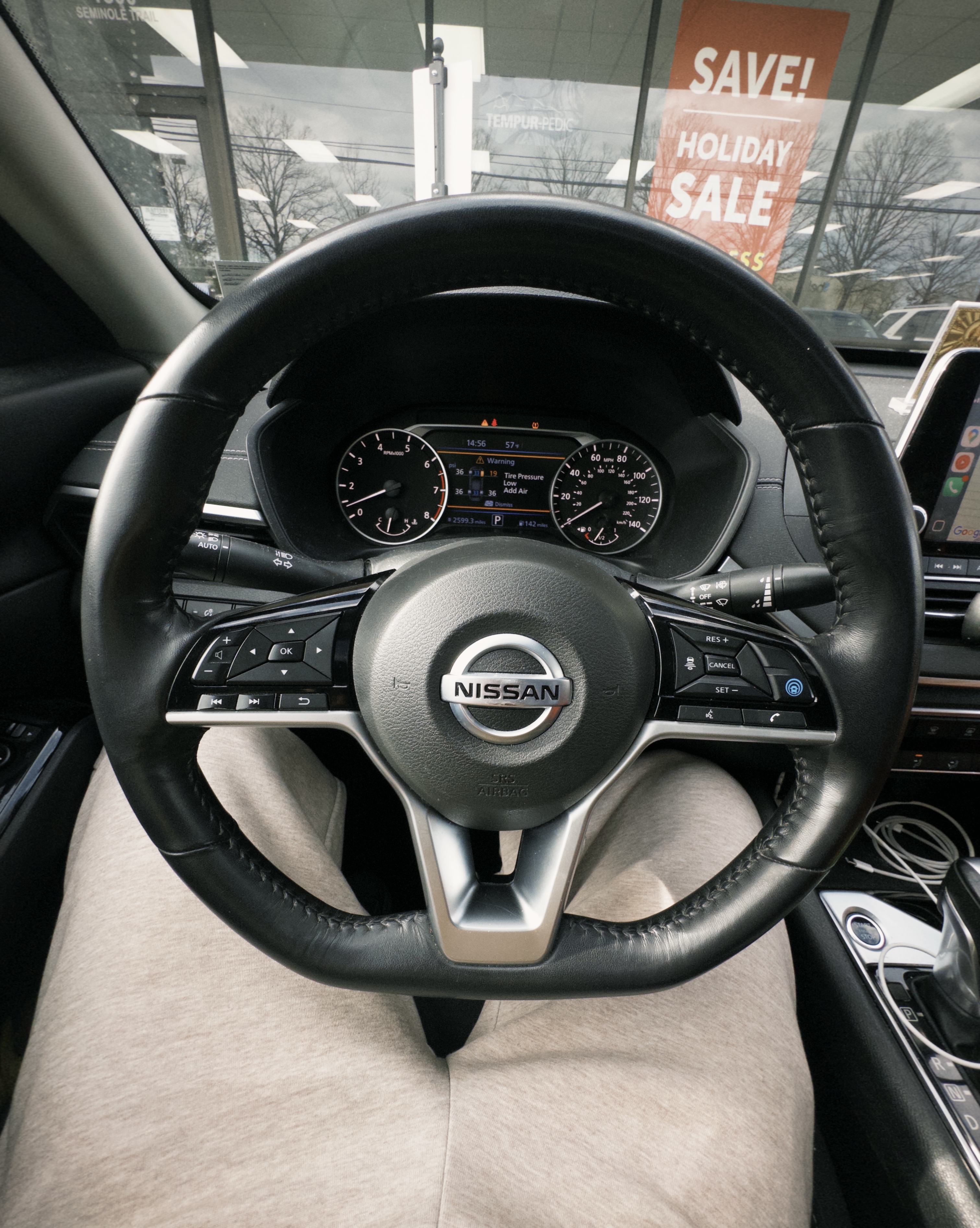 The steering wheel and dashboard